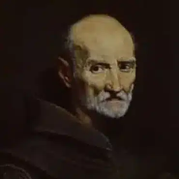 A painted portrait of an older man with a bald head, white beard, and moustache in a dark robe, set against a shadowy background. He gazes solemnly to the side, evoking the gravity of Demilitarising Saint Patrick’s Day 1921.